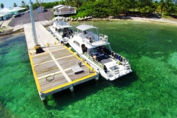 Cayman Brac Beach Resort - Cayman Islands. Dive boat jetty.